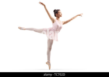 Volle Länge Schuß einer jungen schönen Ballerina tanzen auf weißem Hintergrund Stockfoto