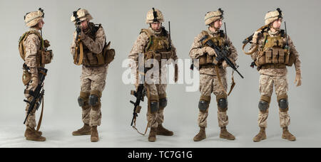 Soldat in der Tarnung holding Gewehr Stockfoto