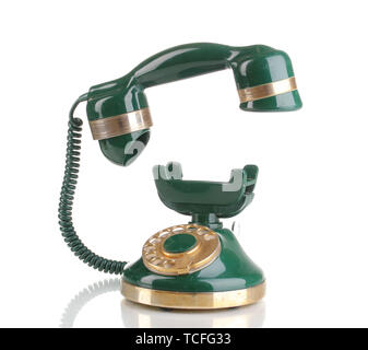 Retro phone mit schwebenden Hörer isoliert auf weißem Stockfoto