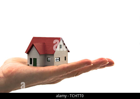 Ein Bild von einer Seite, die mit einem roten Dach Haus mit leeren Hintergrund. Isoliert Stockfoto