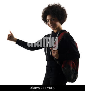 eine Mischrasse afrikanischer Jugendlicher Mädchen Frau isoliert Thumbs Up Studio Schatten Silhouette auf weißem Hintergrund Stockfoto