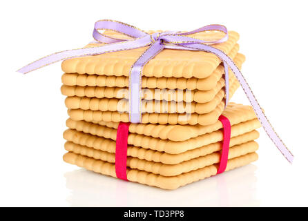 Süße cookies gebunden mit bunten Bändern isoliert auf weißem Stockfoto