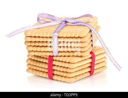 Süße cookies gebunden mit bunten Bändern isoliert auf weißem Stockfoto