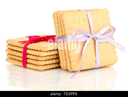 Süße cookies gebunden mit bunten Bändern isoliert auf weißem Stockfoto