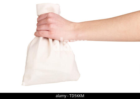 Kleine Sack in der Hand, isoliert auf weißem Stockfoto