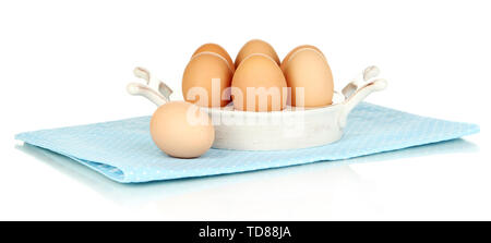 Eier in der Platte für Eier isoliert auf weißem Stockfoto