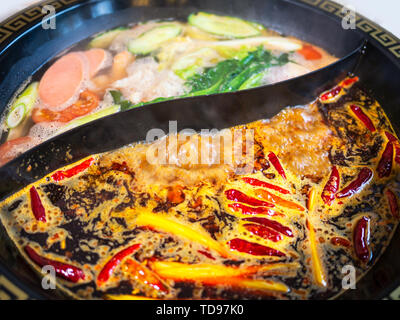 Siedepunkt Mandarinente hotpot Stockfoto