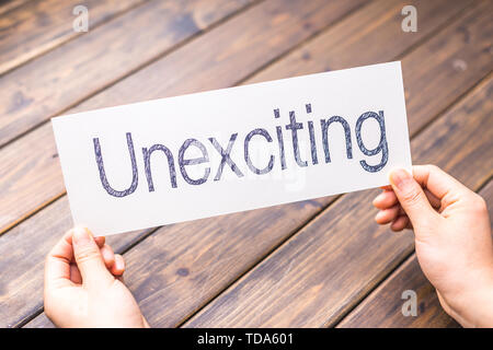 Händen halten Weißbuch mit Word unexciting Stockfoto