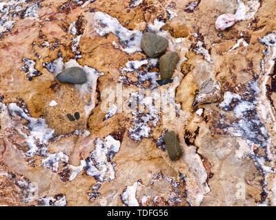 Makro des großen roten und orangefarbenen Felsen Stockfoto