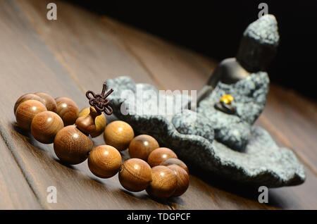 Gold Seide Namu Buddha Bead Armband Stockfoto