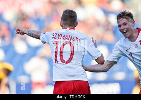 Sebastian Szymanski von Polen feiert zählenden Dritten Ziel während der UEFA U-21 Europameisterschaft Match zwischen Polen U-21 v Belgien U-21 an Stadio Cittˆ del Tricolore, Reggio Emila, Italien am 16. Juni 2019. Stockfoto