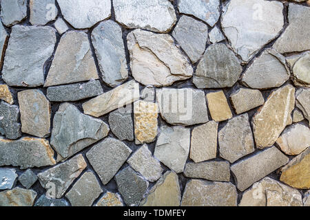 Stein Wand Textur HD-Material mit Hintergrundinformationen, in Qilu Wein malerischen Ort fotografiert. Stockfoto
