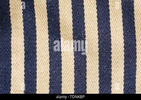 Fischgrat tweed Hintergrund mit Nahaufnahme auf Stoff Textur. Gestreift blau und weiß Material Stockfoto