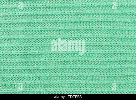 Grüne Stricken Textur oder gestrickt Textur Hintergrund in Makro Stil. Stricken Textur oder gestrickt Textur in Vintage Style für Design Stockfoto