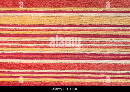 Rot Gelb Teppich Textur oder Teppich Hintergrund. Rot Gelb Teppich Textur oder Teppich Hintergrund für Design Stockfoto