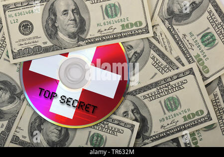 Steuerhinterziehung, CD mit Suisse Kreuz, lable Top Secret und Dollarscheine, Suisse Bankkonto, Schweiz Stockfoto