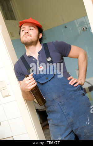 Removalist eine Pause, ein Bier trinken, rauchen Stockfoto