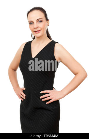 Gut aussehende Frau in einem schwarzen Kleid Stockfoto