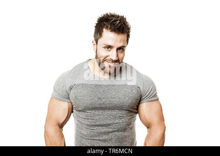 Junge muskulöse Mann im t-shirt, Deutschland Stockfoto