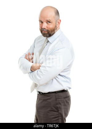 Zuversichtlich im mittleren Alter businessmann Stehen mit verschränkten Armen, Seitenansicht, Deutschland Stockfoto