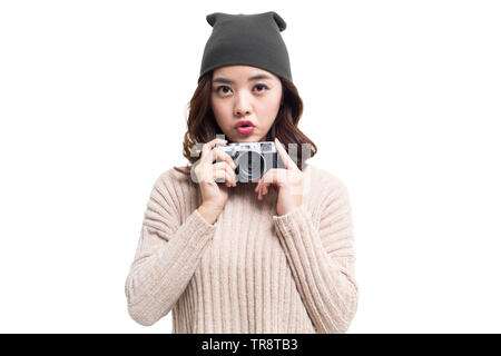 Junge Frau Holding Kamera Stockfoto