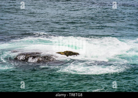 Felsen im Meer Stockfoto