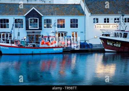WEYMOUTH, Großbritannien - 20.Mai 2019: Der alte Hafen ist ein malerischer Hafen an der Küstenort Weymouth in Dorset, Südengland. Stockfoto