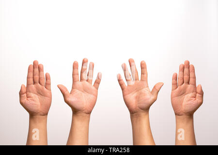 Heben Sie die Hand nach oben, links und rechts heben Isolieren auf weißem Hintergrund in vier Aktion. Stockfoto