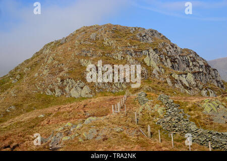 Rauhe Felsen von Eagle Crag auf die Besteigung des Wainwright High Street im Nationalpark Lake District, Cumbria, England, Großbritannien Stockfoto