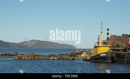 Ex tugboat Kowhai am Dock am Seaview, Mund der Hutt River, den Hafen von Wellington. Kowhai wird jetzt verwendet, Lastkähne der ausgebaggert Felsen von Hafen zu bewegen Stockfoto