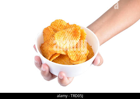 Chips Schüssel in der Hand auf weißem Hintergrund Stockfoto