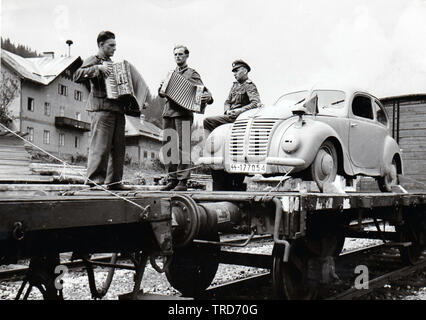 Deutsche Soldaten von der SS-Panzerdivision Wiking Musikinstrumente Accordian om Troop Transport Zug an der Ostfront 1944 PK SS KB Ernst Baumann Stockfoto