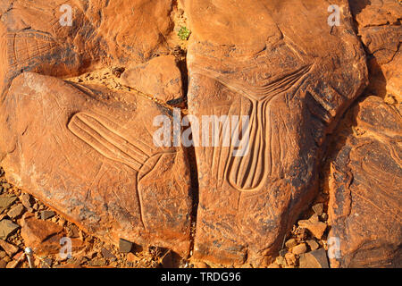 Prähistorische Petroglyphen, Angelausrüstung, Marokko, Ait Ouazik Stockfoto