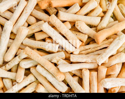 Snack sticks salzig Cracker Brezel auf Textur Hintergrund Stockfoto
