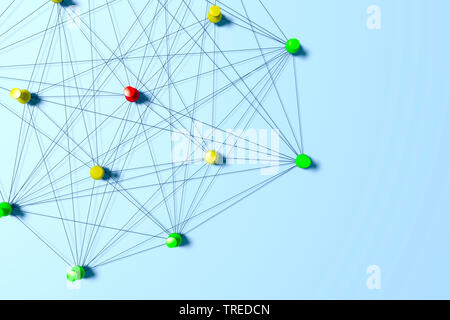 Pins verbunden mit schwarzem Garn und symbolisiert eine Netzwerkstruktur Stockfoto