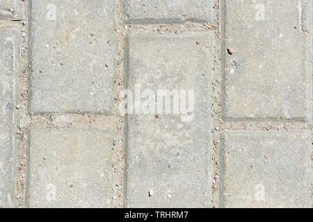 Graue Pflastersteine Textur hautnah. Pflastersteine Hintergrund Stockfoto
