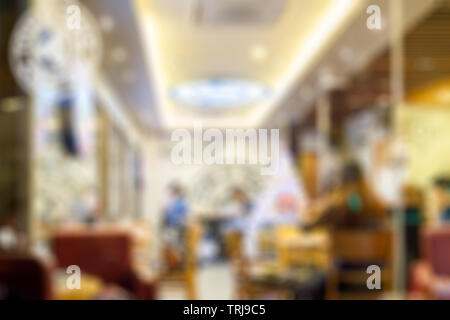 Unscharfer Hintergrund Leute sprachen in einem Cafe Coffee Shop Stockfoto