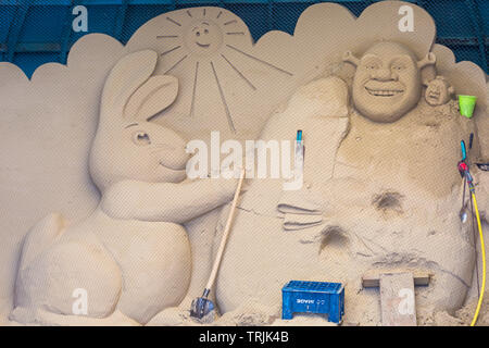 Shrek Sand Skulptur am Strand von Weymouth, Dorset UK im Juni Stockfoto