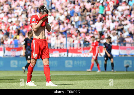 Osijek, Kroatien. 08 Juni, 2019. Gareth Bale von Wales reagiert und sieht niedergeschlagen. Kroatien v Wales, UEFA Euro nähere Bestimmung 2020, Gruppe E Match im Stadion Gradski in Osijek, Kroatien am Samstag, den 8. Juni 2019. Dieses Bild dürfen nur für redaktionelle Zwecke verwendet werden. Redaktionelle Verwendung nur, pic von Gareth John/Andrew Orchard sport Fotografie/Alamy Live news Credit: Andrew Orchard sport Fotografie/Alamy leben Nachrichten Stockfoto