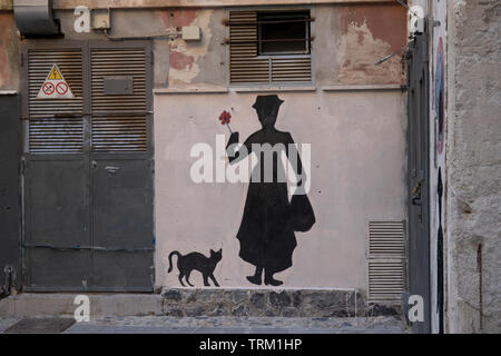 Mary Poppins Holding eine Blume mit einer Katze. Wandfarbe schwarze Silhouette im freien Wand. Stockfoto