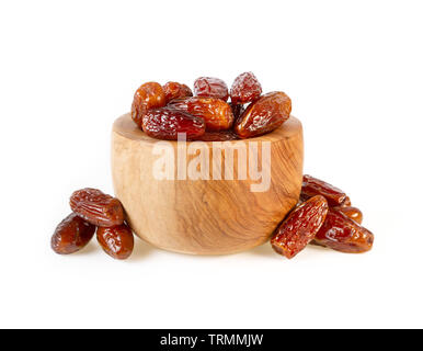 Getrocknete Datteln Sweet Palm Termine in Holz- Cup isoliert auf weißem Stockfoto