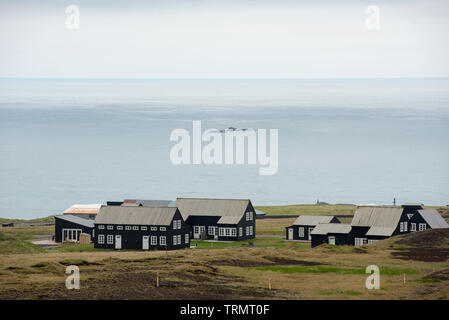 Kleine eco Häuser, auf dem Land Bauernhof am Meer in Island Stockfoto