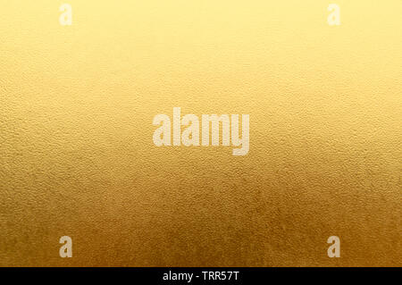 Glänzend gelb Metallic Gold leaf Folie Textur Hintergrund Stockfoto
