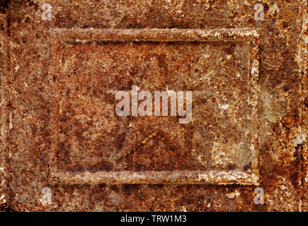 Hintergründe und Texturen: sehr altes rostiges Eisen- Panel mit Stern Relief Stockfoto