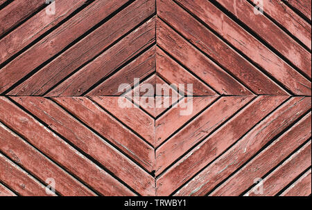 Rot, alte Holztüren mit abblätternde Farbe, abstrakten Hintergrund der Planken Stockfoto