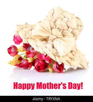 Kleine Stroh Hut mit Blumen, isoliert auf weißem Stockfoto