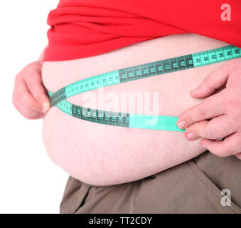 Fat Man holding Maßband. Konzeptionelle Foto von Gewichtsverlust. Auf weiß Isoliert Stockfoto