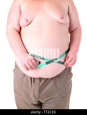 Fat Man holding Maßband. Konzeptionelle Foto von Gewichtsverlust. Auf weiß Isoliert Stockfoto