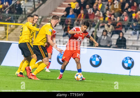 Brüssel, Belgien - 21. März 2019. Russland Nationalmannschaft Mittelfeldspieler Ilzat Achmetow gegen Belgien Nationalspieler Tim Castagne, Youri Thiel Stockfoto