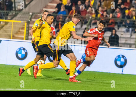 Brüssel, Belgien - 21. März 2019. Russland Nationalmannschaft Mittelfeldspieler Ilzat Achmetow gegen Belgien Nationalspieler Tim Castagne, Youri Thiel Stockfoto